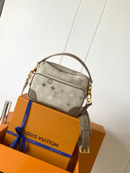 Louis Vuitton Nil — Sand Beige Monogram Surplus — Article 957