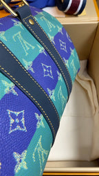 Louis Vuitton Keepall Bandouliere 25 - Blue Stripes Monogram Heritage — Article 1715