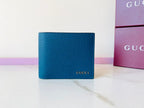 Gucci Logo Bi-Fold Wallet — Blue Leather — Article 65