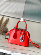 Louis Vuitton Alma BB Epi Rainbow — Orange California — Article 946