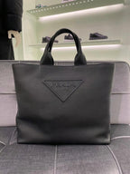 Prada Embossed Triangle Leather Tote Bag - Black — Article 1383