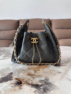 Chanel 25 Mini Handbag — Black Grained Calfskin — Article 334