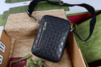 Gucci GG Emblem Small Crossbody Bag - Black Embossed GG Leather — Article 450