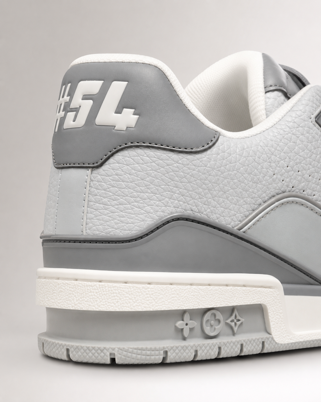 Men’s Grey & White Sneakers - detailed close up of luxury sneaker heel