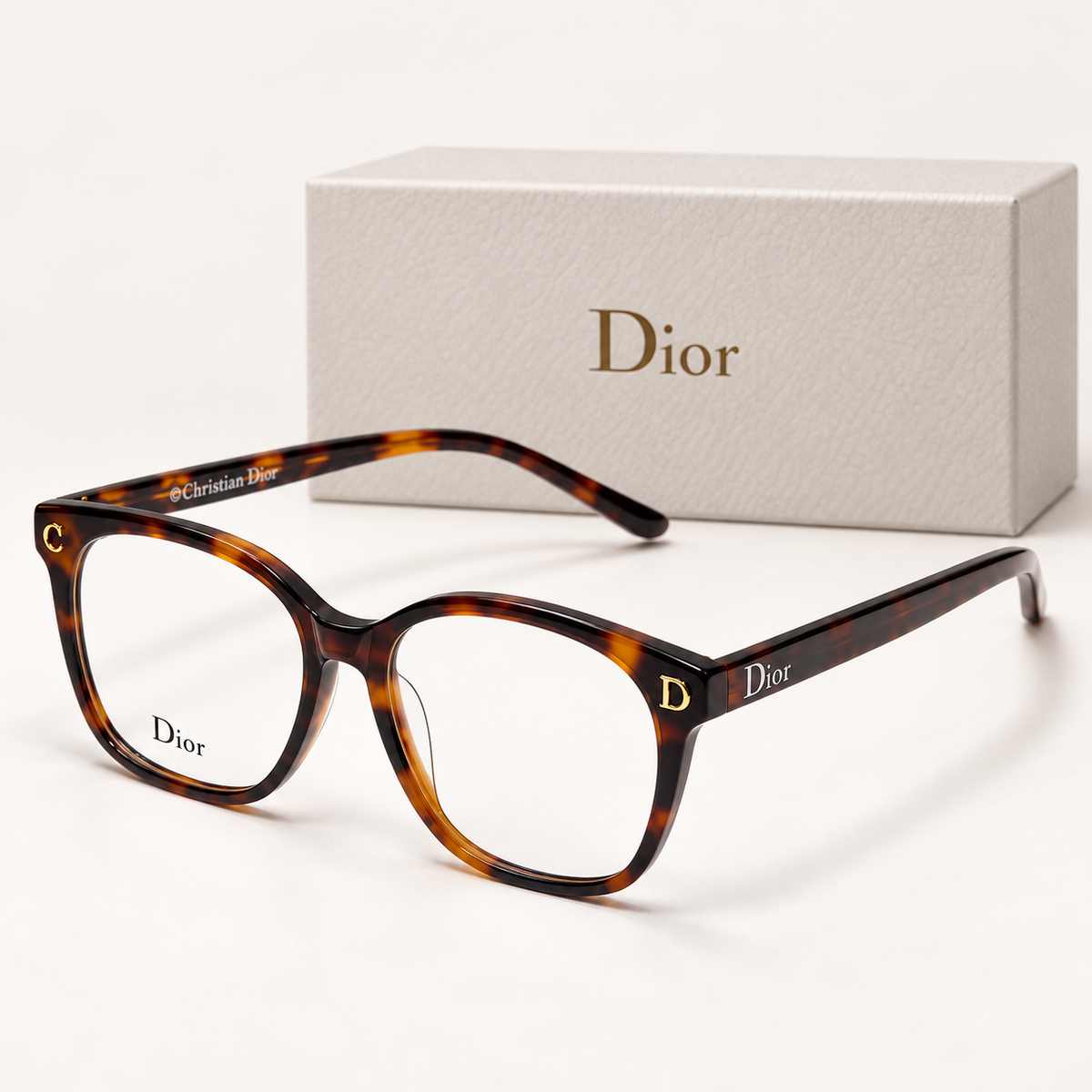 CD Tortoiseshell Square Eyeglasses — front-left view with brand box
