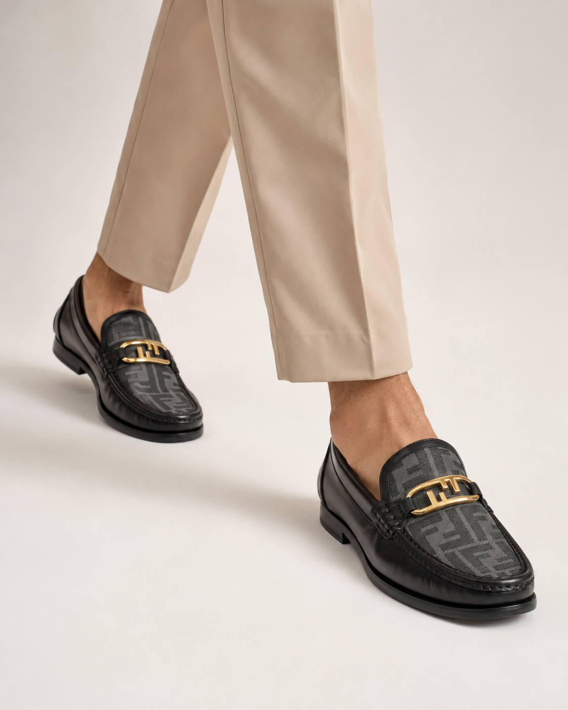 Men’s Black patterned Gold-Buckle Loafers - luxury men's loafers in motion