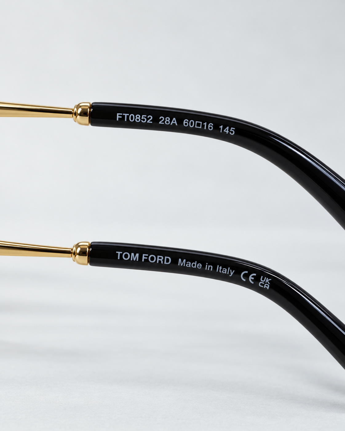 tom ford ft0852 28a gold navigator sunglasses — inner temple detail