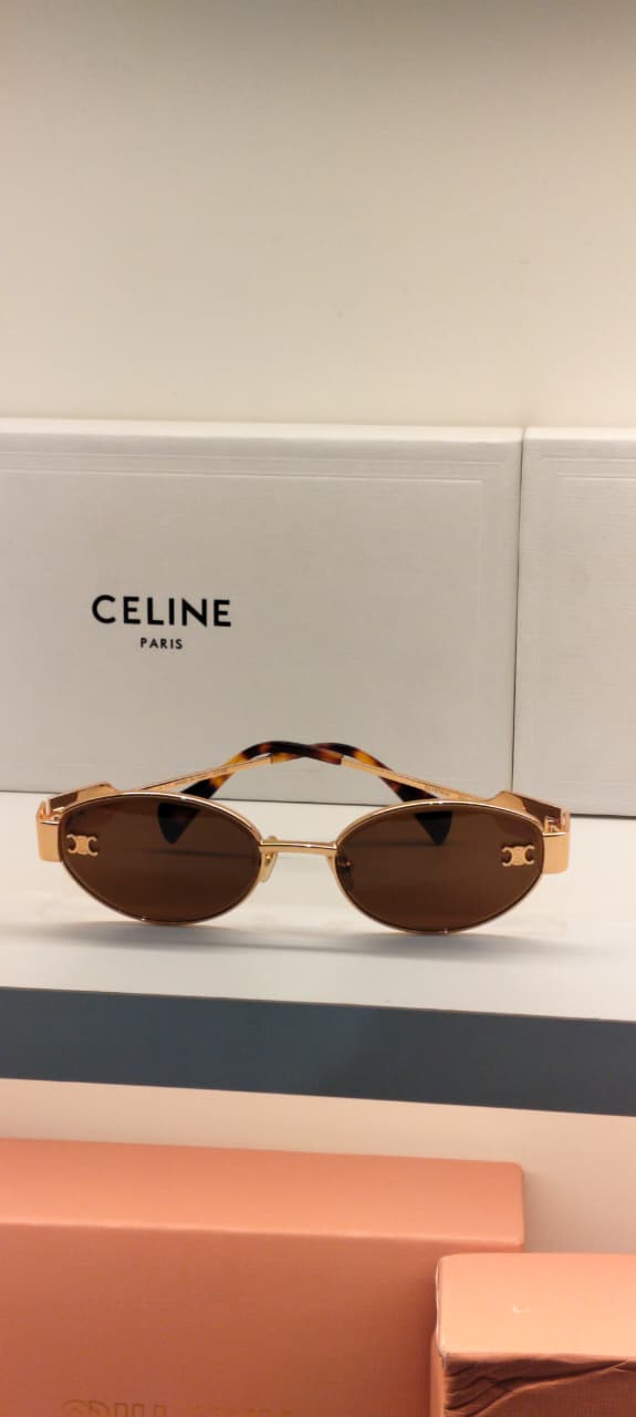 CLN — Gold Brown Oval Sunglasses – Model 1 - actual product photograph 1